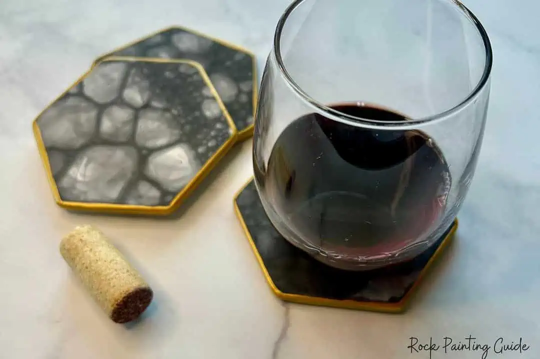 Make Stunning DIY Coasters with Bubble Painting Magic! 10 diy coasters with a glass of red wine and cork