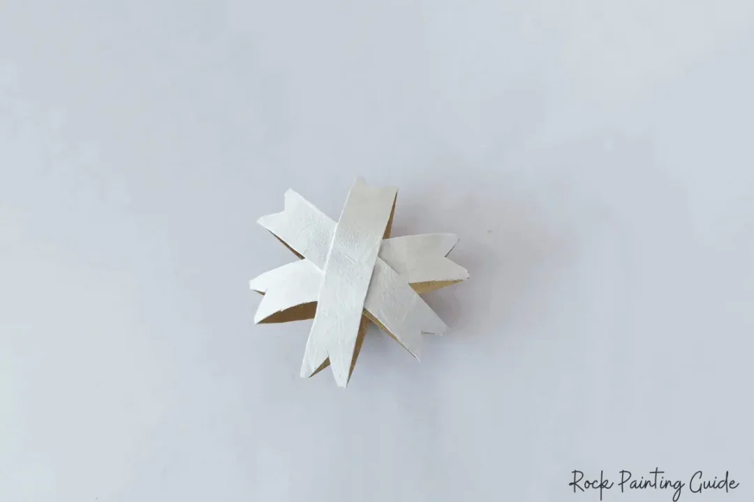 DIY Christmas Star Ornaments: A Fun Holiday Craft for Kids 8 star ornament painted white