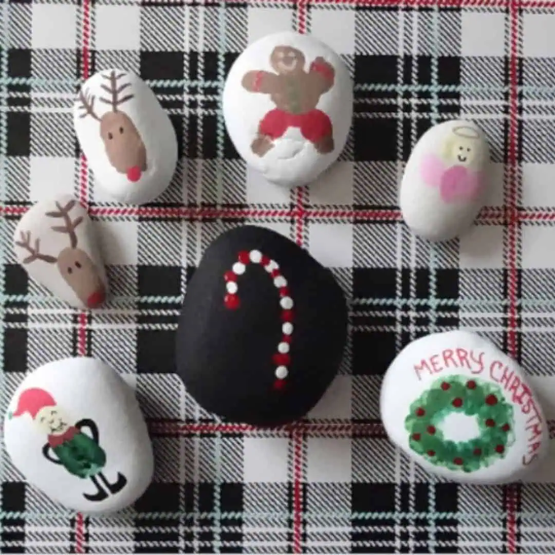Mom Approved - Christmas rock painting Crafts that your kids will love 3 Christmas painted rocks