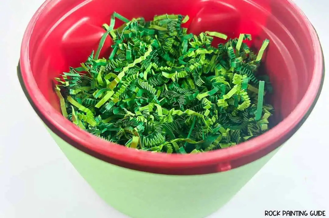 Make a Magical Leprechaun Trap in Minutes with Dollar Tree Finds 6 green shredded paper