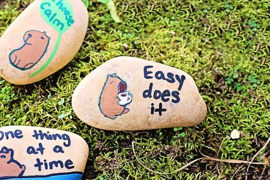 Create Capybara Painted Rocks for effortless Slow Living 10 Hand-painted inspirational rocks for rock painting craft projects.