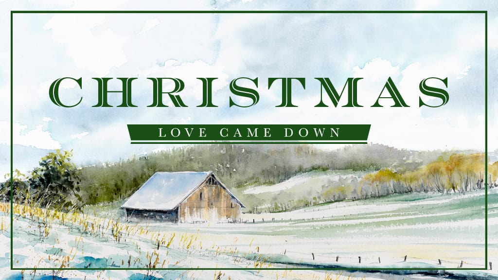 Christmas scene with a rustic barn and snowy landscape at Rolling Hills Community Church.