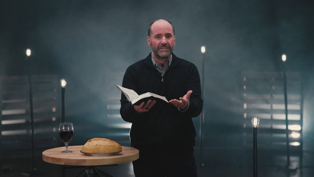 Community pastor speaking during service at Rolling Hills Church, engaging congregation with faith a.