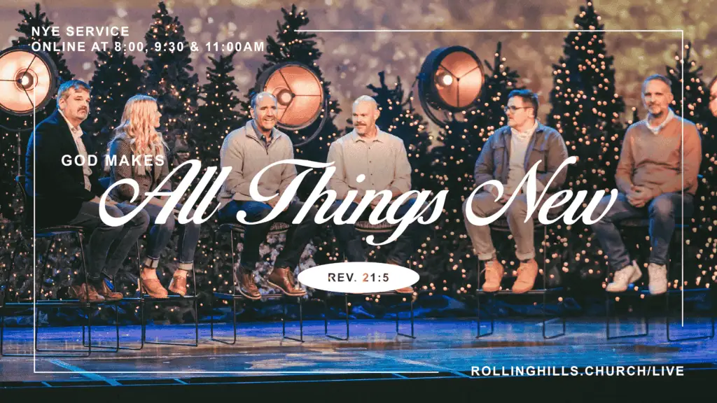Group of people on stage during Christmas service at Rolling Hills Church with decorated trees.