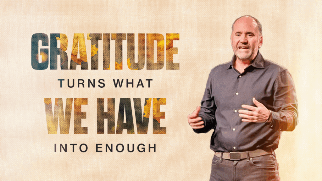 Man speaking at church event about gratitude and contentment.