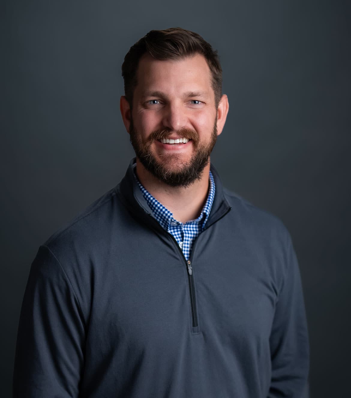 Portrait of a smiling pastor at Rolling Hills Community Church.