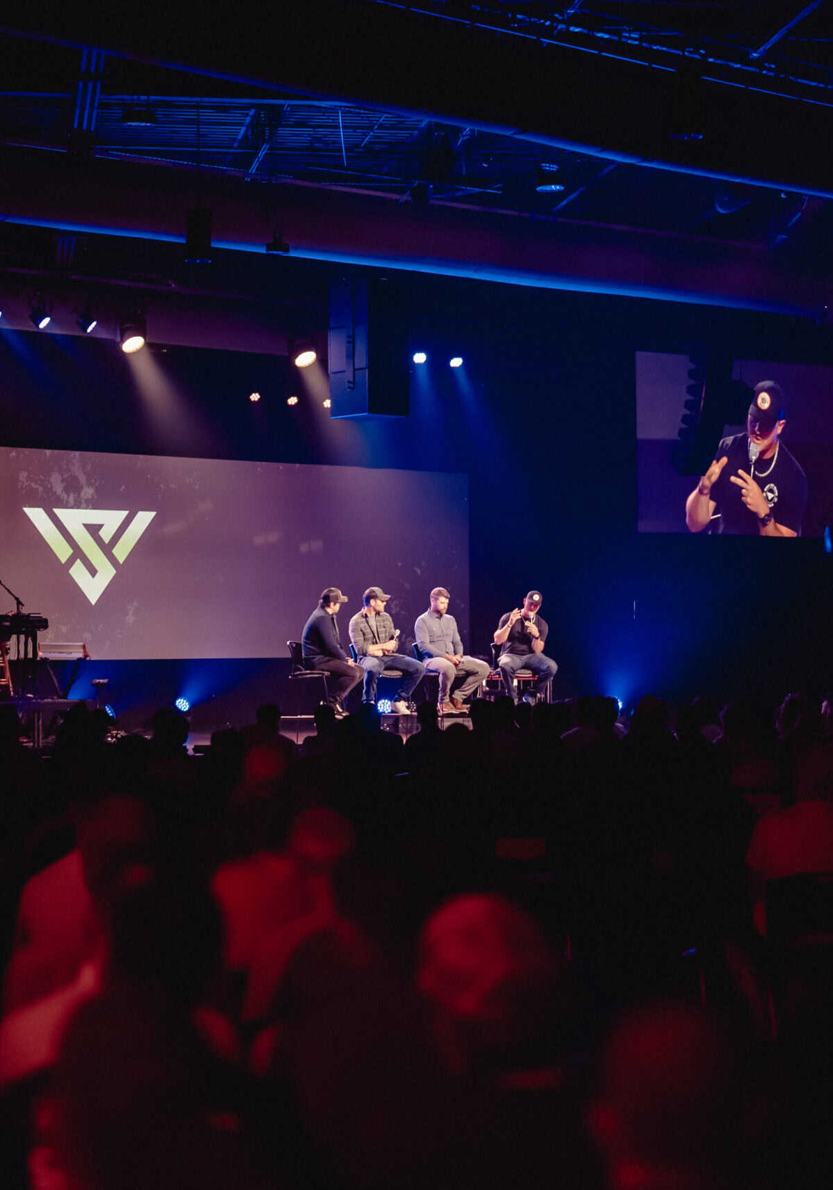 Worship event at Rolling Hills Community Church with live speakers and audience.