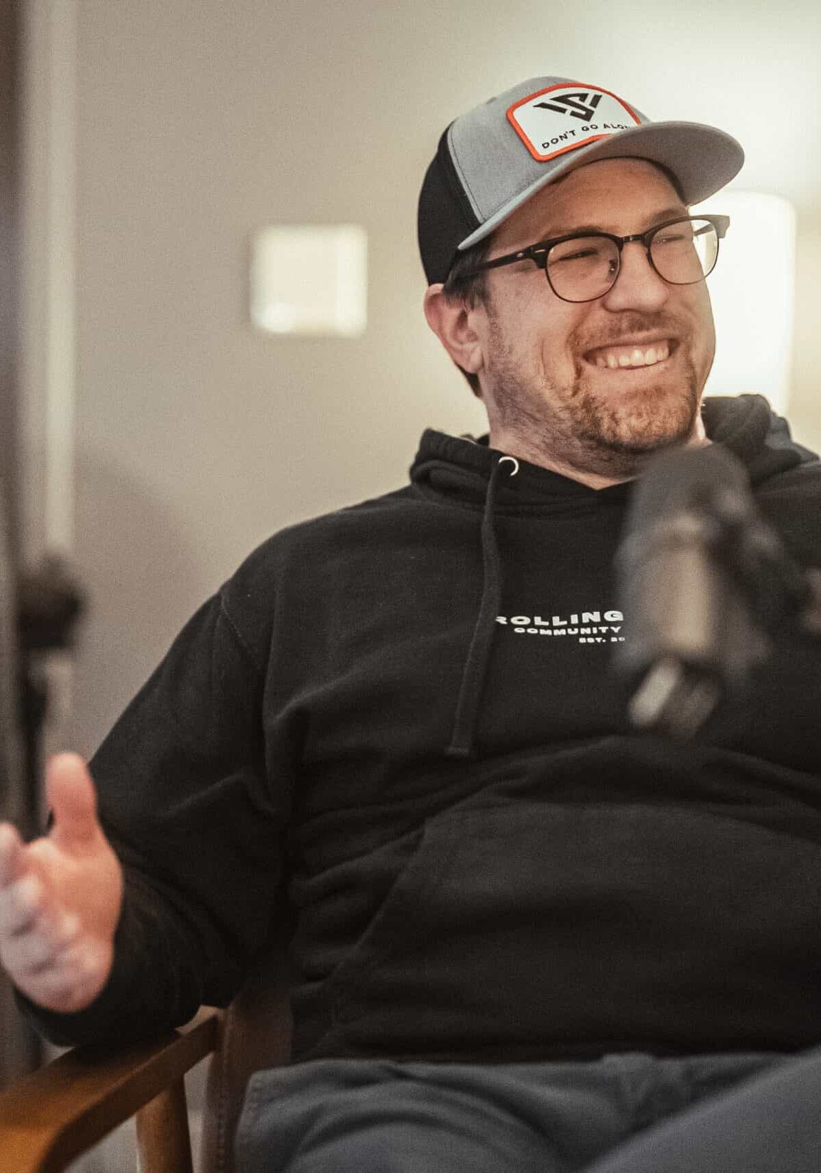 Man smiling during podcast recording at Rolling Hills Community Church.