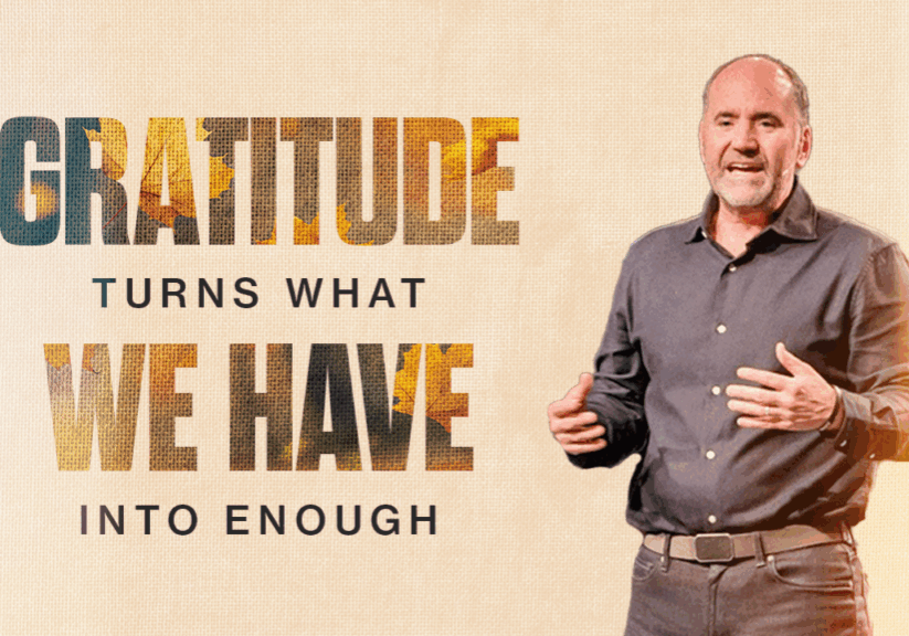 Man speaking at church event about gratitude and contentment.