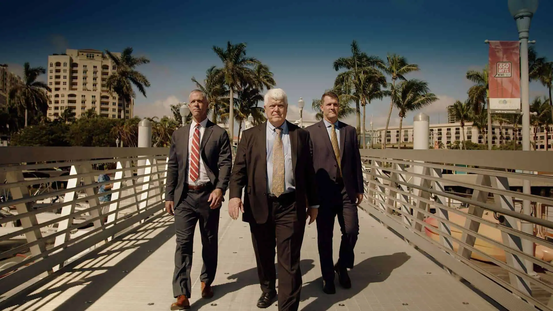 Todd, John and Eric Romano walking together outside