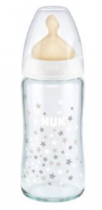 Baby bottle with nipple, transparent with star pattern, for infant feeding.