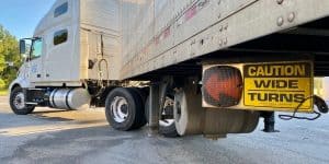 What role does off-tracking play in truck crashes?