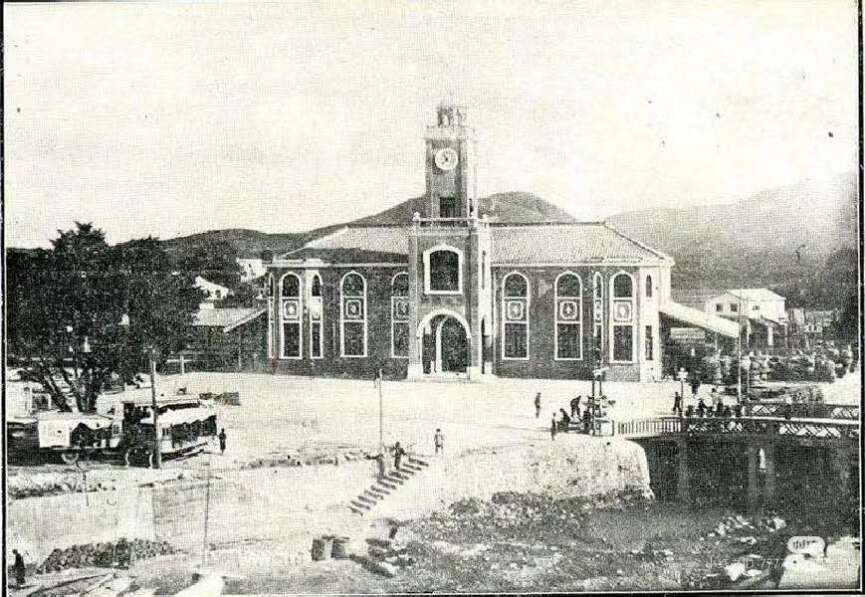 Historic photo of Beijie Station, a key stop on the Sunning Railway in Guangdong, China, showcasing its clock tower and European-style architecture.