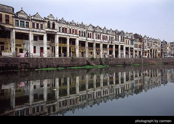 Kaiping diaolou — a multi-story fortified tower built with overseas remittance money, managed by jinshanpo during construction