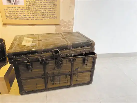 A jinshanxiang (金山箱) — the ornate storage trunk used by returning Gold Mountain migrants to carry goods home