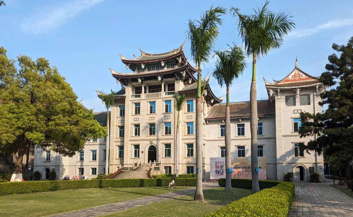 Contemporary Taishan streetscape near Haiyan Overseas Chinese Farm, showing modern Wuyi qiaoxiang community life