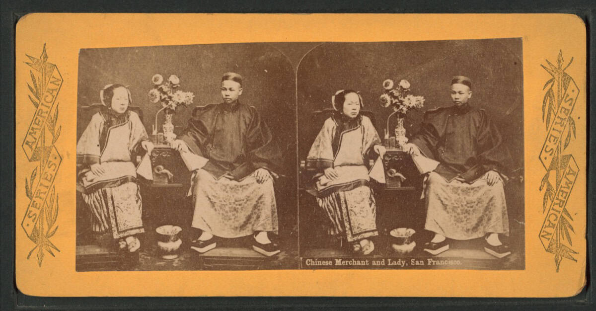 A Chinese merchant and lady in San Francisco Chinatown, photographed in the late 19th century — representing the Zhou clan diaspora community that established itself in Gold Mountain.