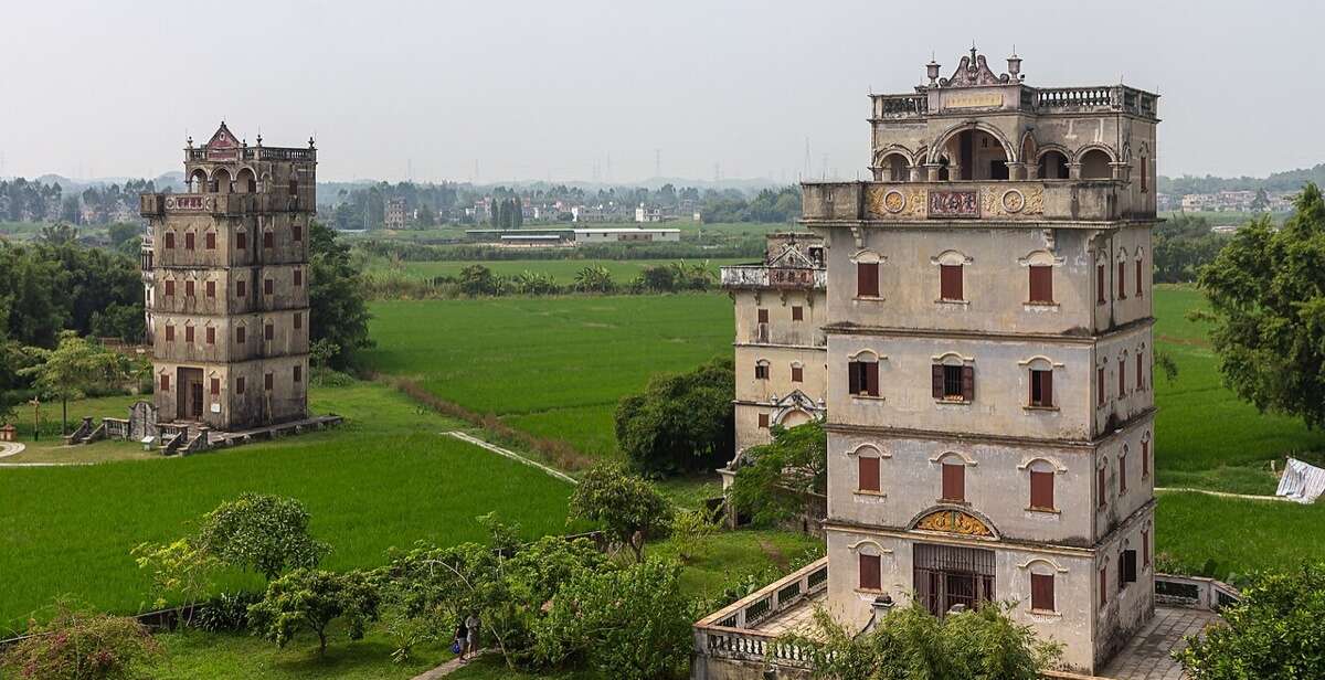 Watchtowers of Zili village rising from the rice paddies of the Qiangya village cluster in Tangkou, Kaiping.