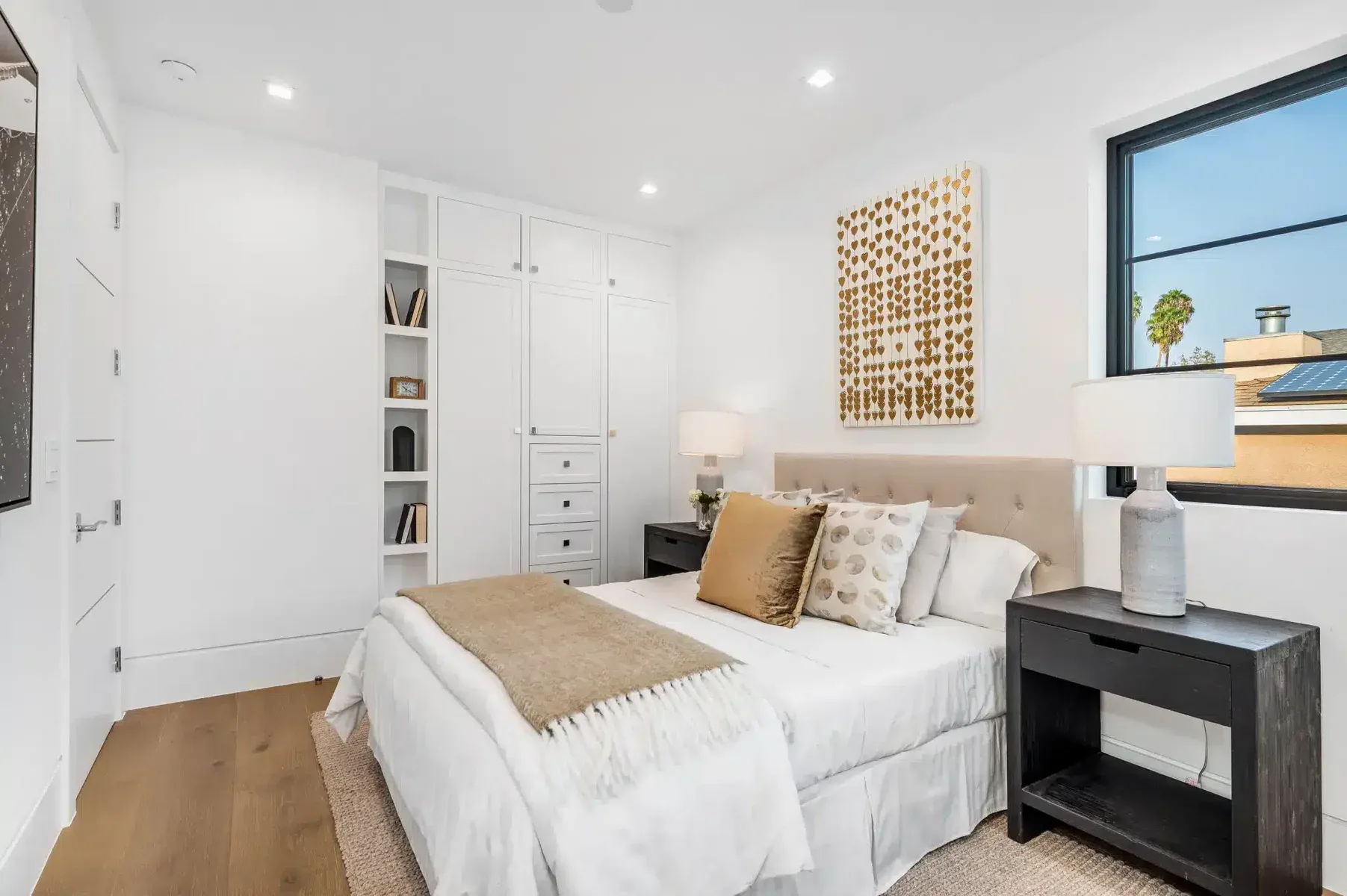 A Well Decorated Bedroom With Hardwood Floors And 2026 01 07 07 23 10 Utc