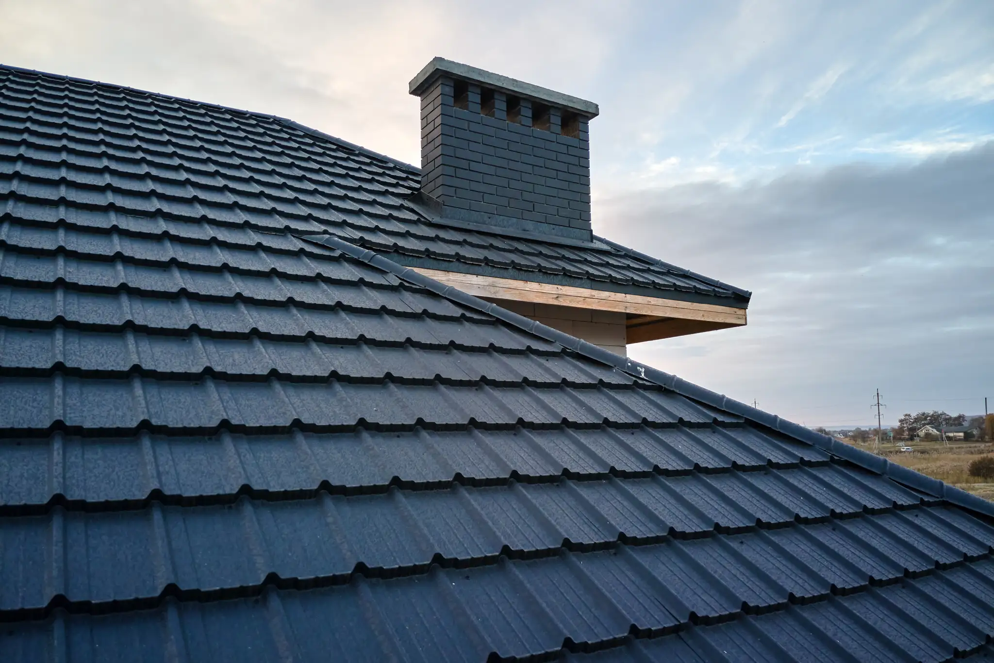 Closeup Of House Roof Top Covered With Metallic Sh 2026 01 07 00 14 37 Utc