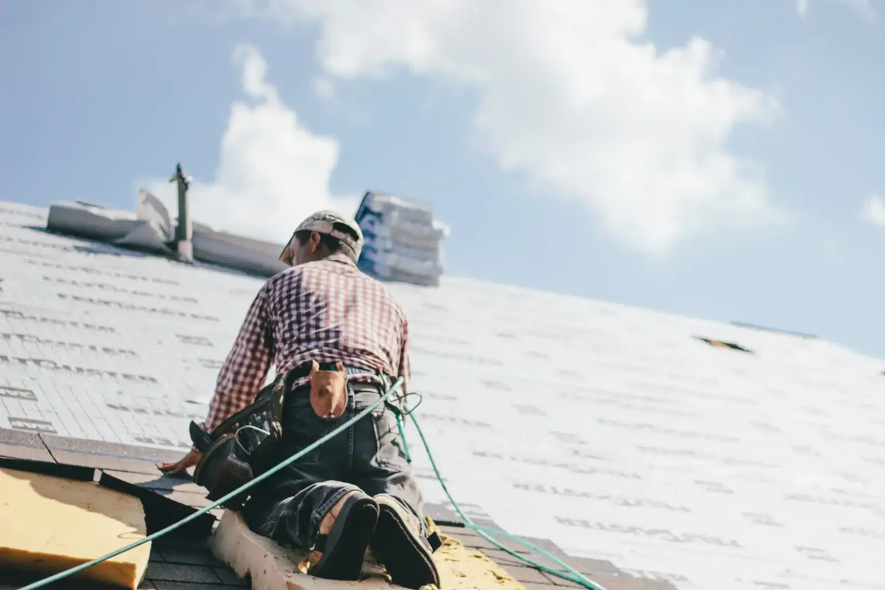 Roofer Adding Shingles To The Roof Of A House 2026 01 07 01 48 17 Utc