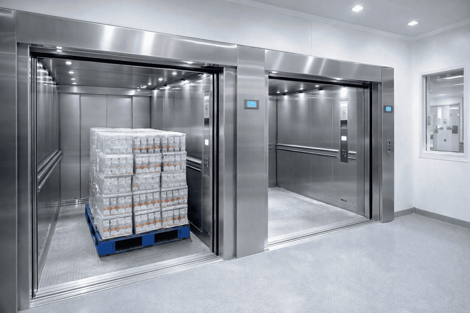 transporte vertical em áreas limpas com elevador de carga industrial em aço inox para medicamentos