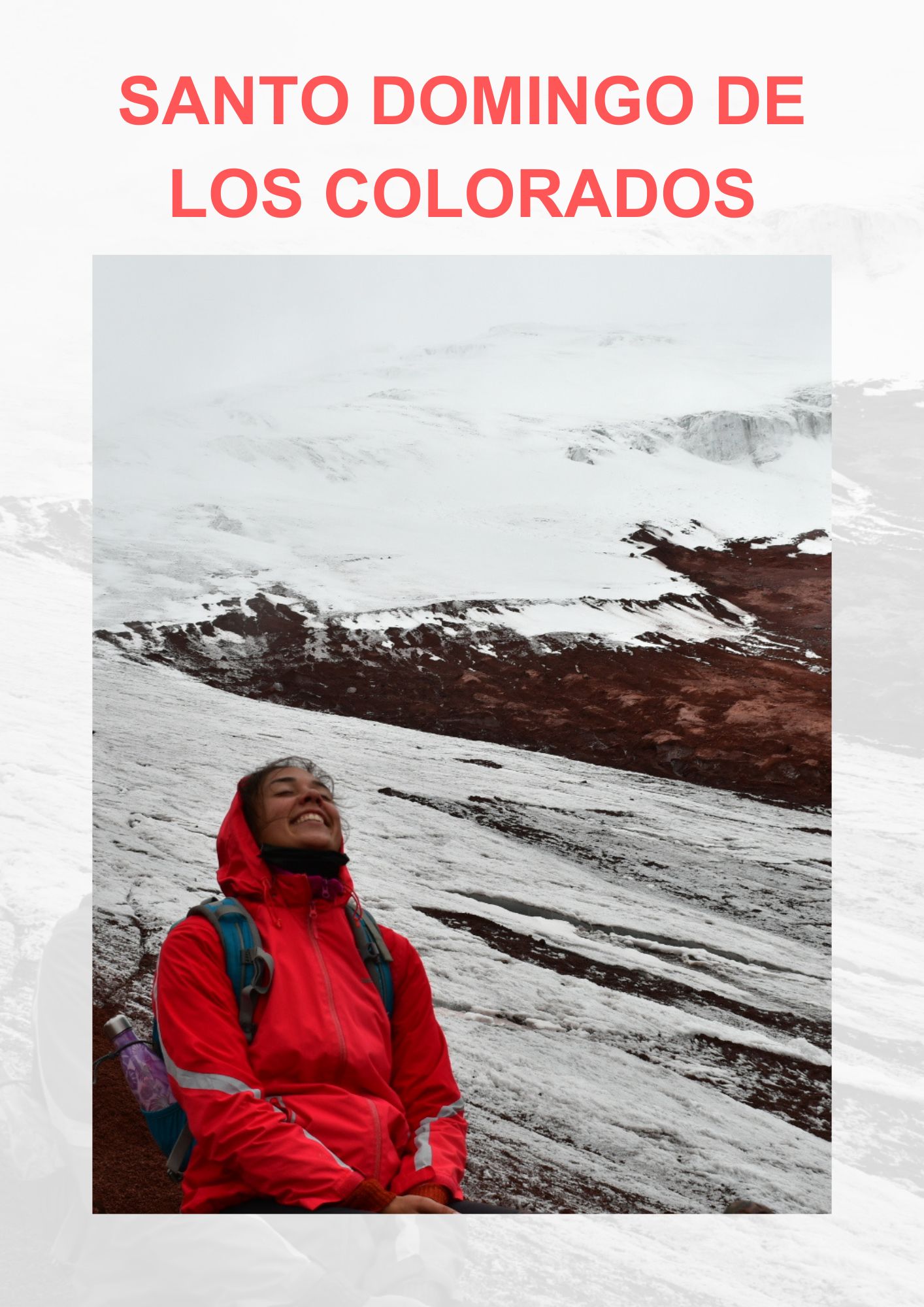 A joyful hiker in a vibrant red jacket sits with eyes closed and head tilted upwards, smiling against the serene backdrop of the snow-dusted Santo Domingo de Los Colorados mountain slope with streaks of red earth visible beneath the white snow.