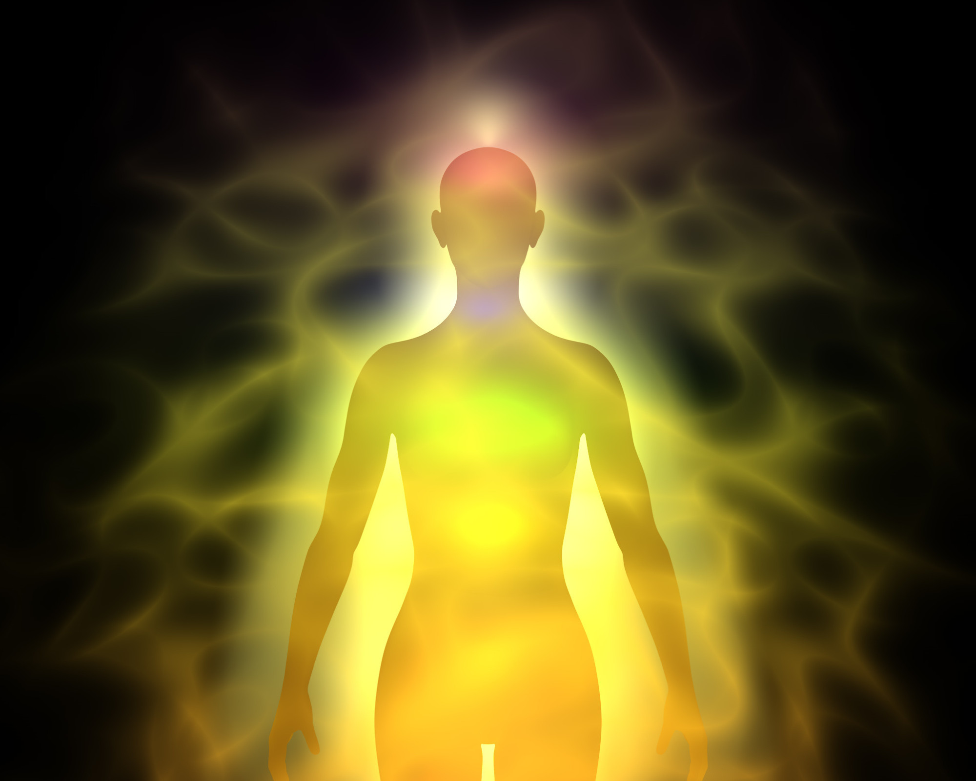 Gold Chakra, aka 10 Chakra: All You Need to Know! Silhouette of a human figure surrounded by a glowing golden aura and subtle chakra colors against a dark background.