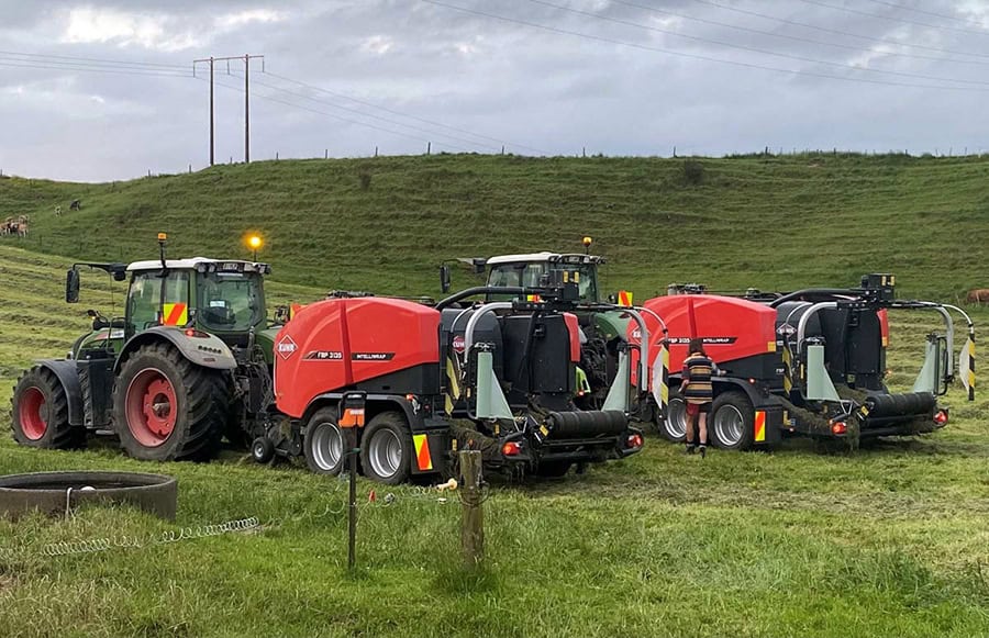 Sanson Agriculture farm machinery in lush green paddock with tractors and land equipment.