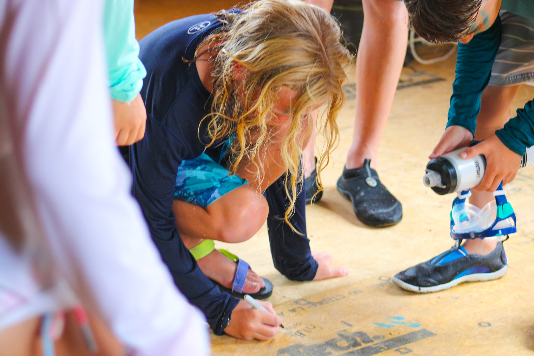 Kids signing floor