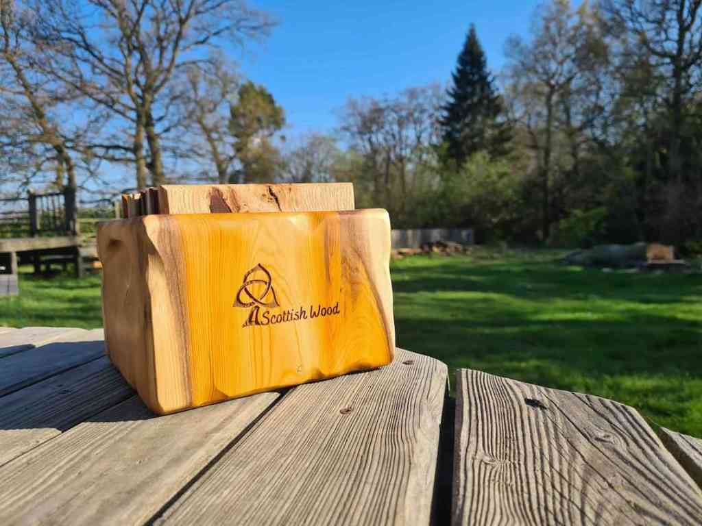 Handmade Yew box, containing samples of various Scottish hardwood samples - a gist presented to Prince Charles from the Storm Arwen Steering Group