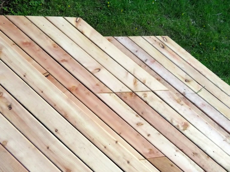 Freshly installed Scottish Larch decking with golden colour