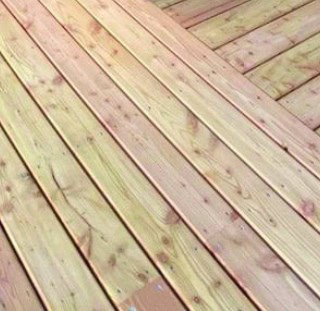 Scottish Larch decking boards - naturally durable heartwood larch with the non-durable sapwood removed