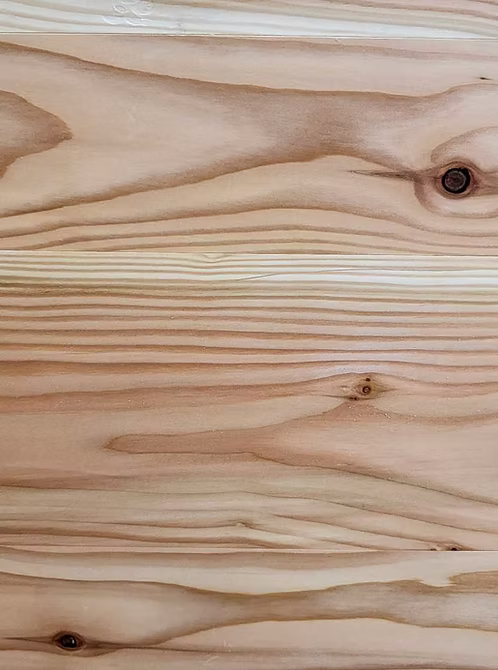 larch flooring ranges from pinkish to orange colour with very defined grain lines