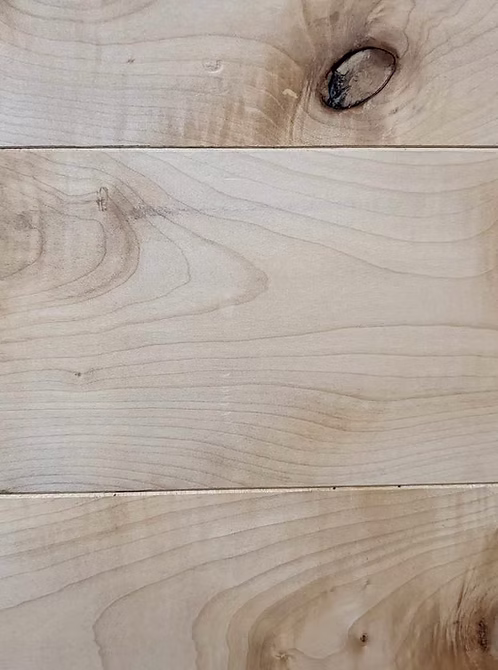 Close up of Sycamore solid hardwood flooring, with pale color and subtle grain