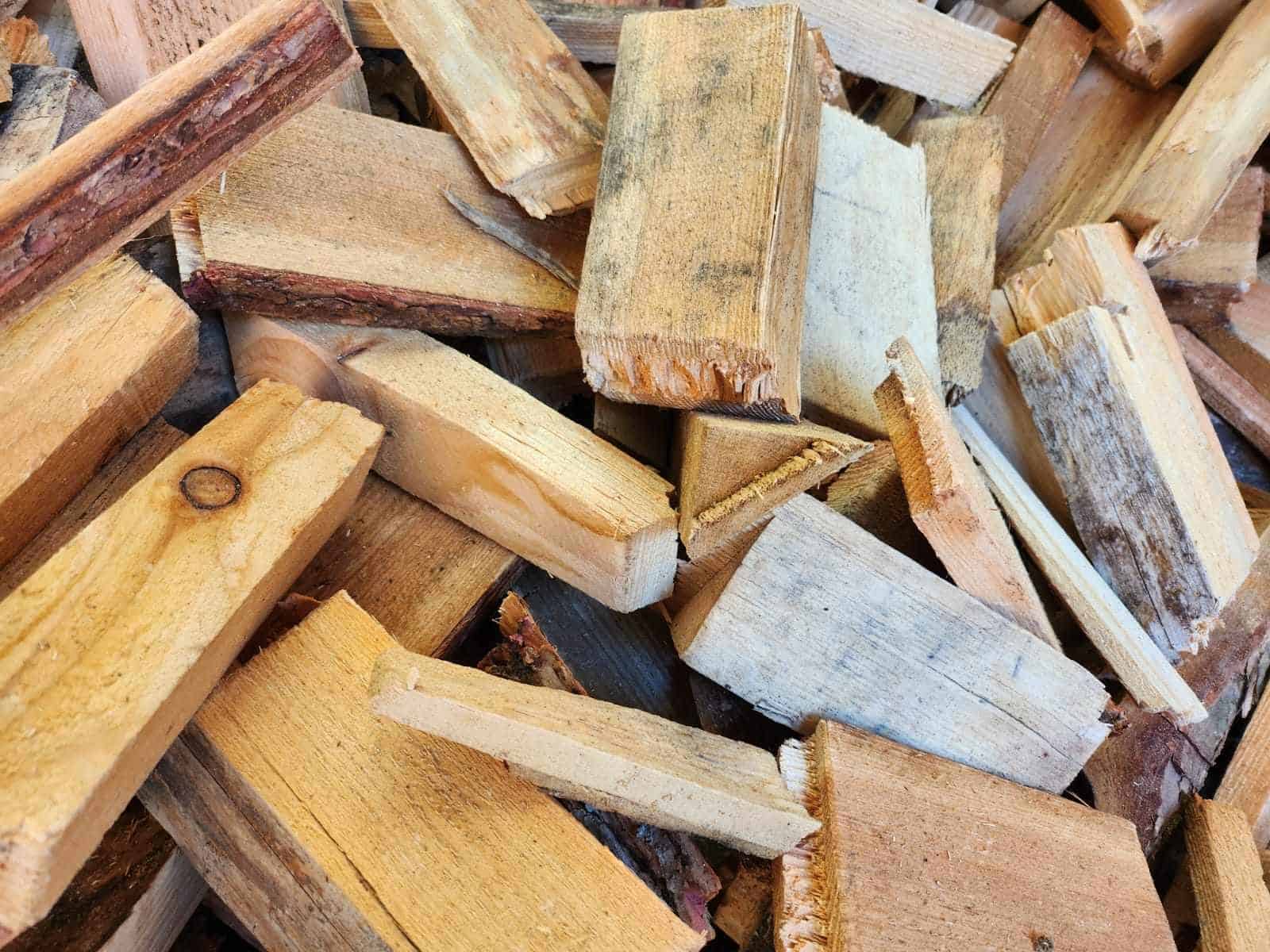 Log firewood, split into medium sized chunks with some thinner slabs through