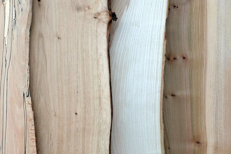 Overlapping Scottish hardwood boards featuring spalted beech, oak, ash and elm