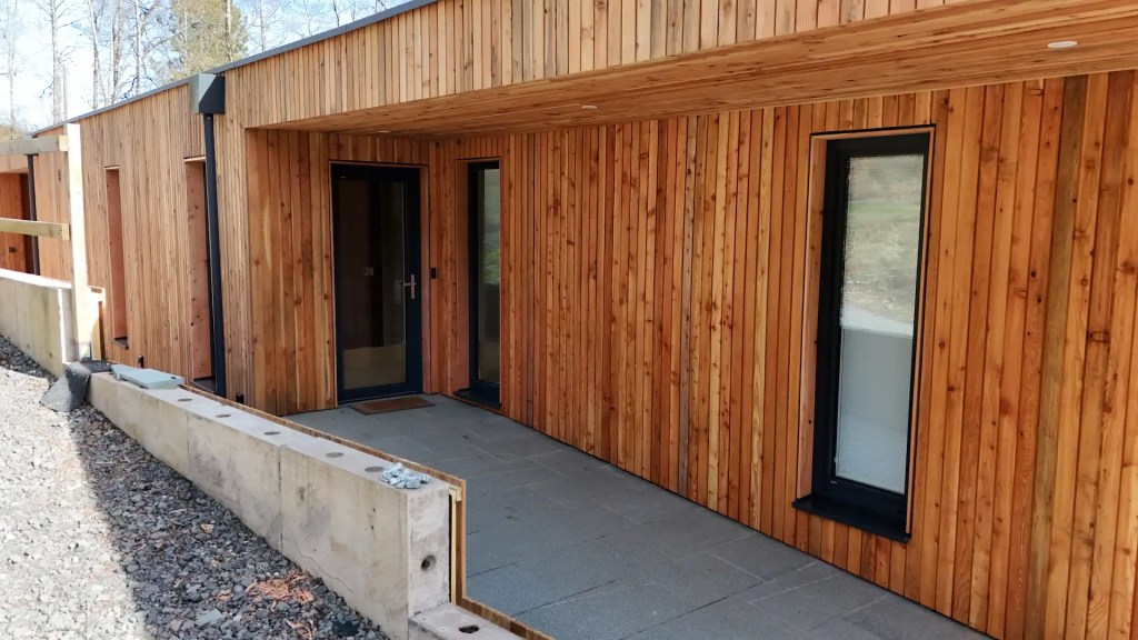 Shadow gap cladding supplied by Scottish Wood in Scottish Larch