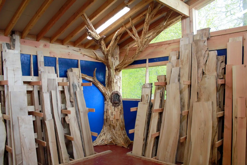 Sculpture of a tree made from homegrown hardwood offcuts, displayed in the Scottish Wood timber shop