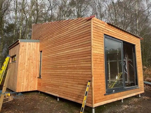 Scottish Larch Shiplap cladding on modern hut