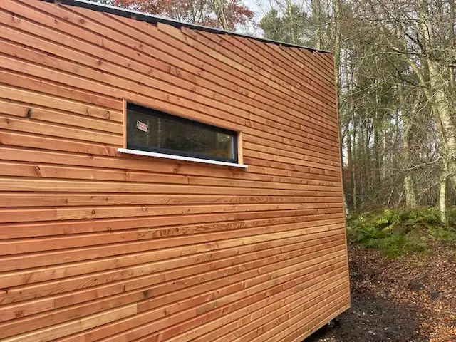 Scottish Larch Shiplap cladding on modern hut