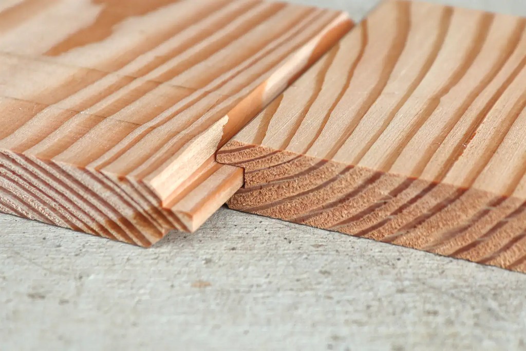 Detail shot of larch V-groove cladding samples