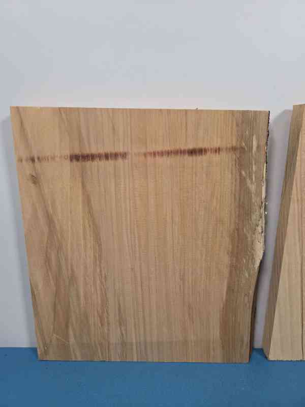 Small Sweet Chestnut offcut showing smooth planed surface and natural wood grain.