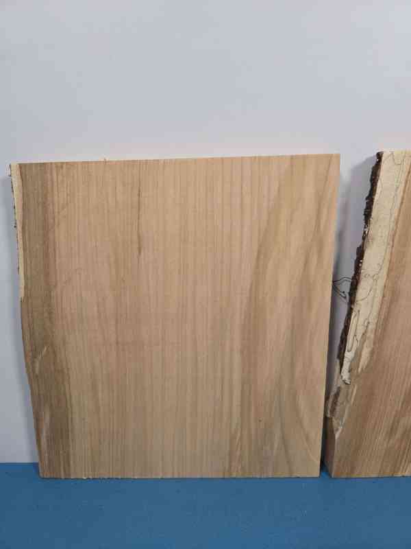 Small Sweet Chestnut timber offcut with smooth surface and waney edge.