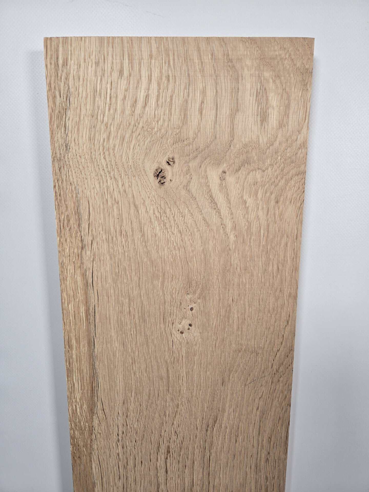 Scottish oak offcut with live edge and natural wood grain.