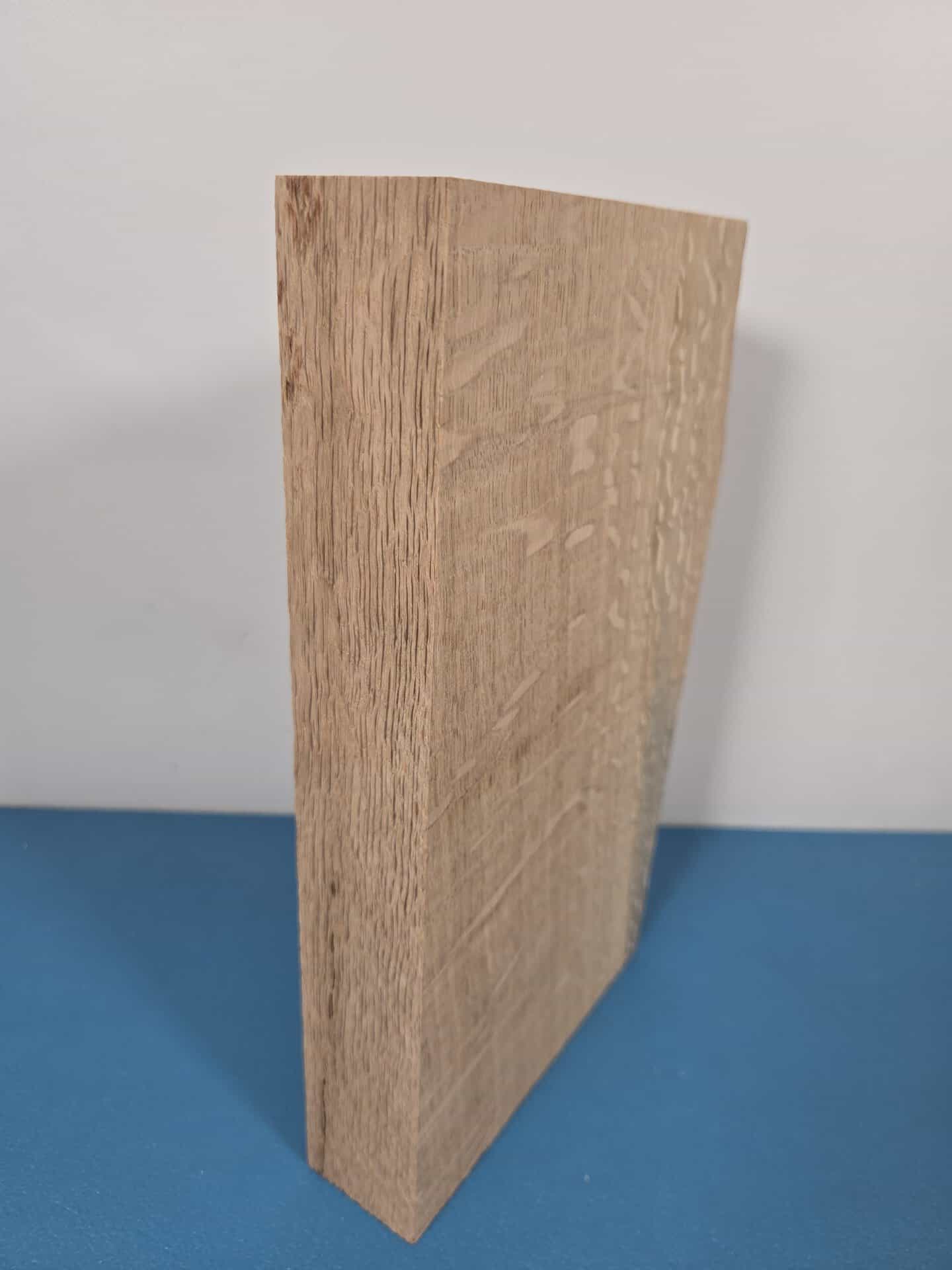 Figured oak offcut with detailed grain and natural finish for woodworking.