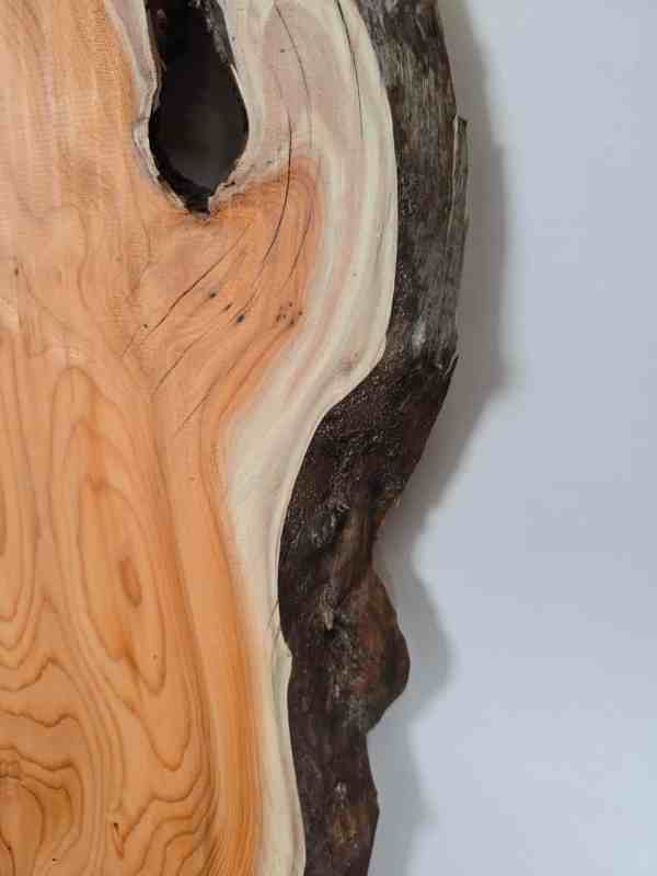 Bold Yew board showing natural grain and mixed light and dark wood tones.