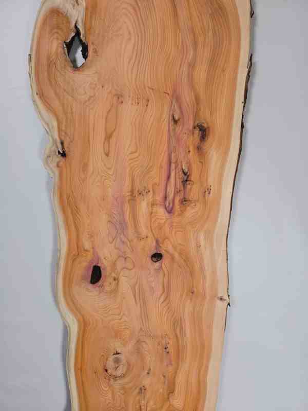 Bold Yew timber board with natural edges and visible grain patterns.