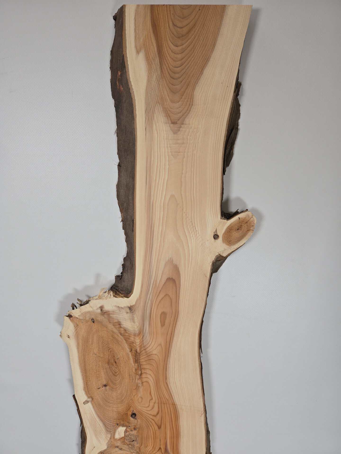 Narrow Yew timber board with natural edges and visible grain pattern.