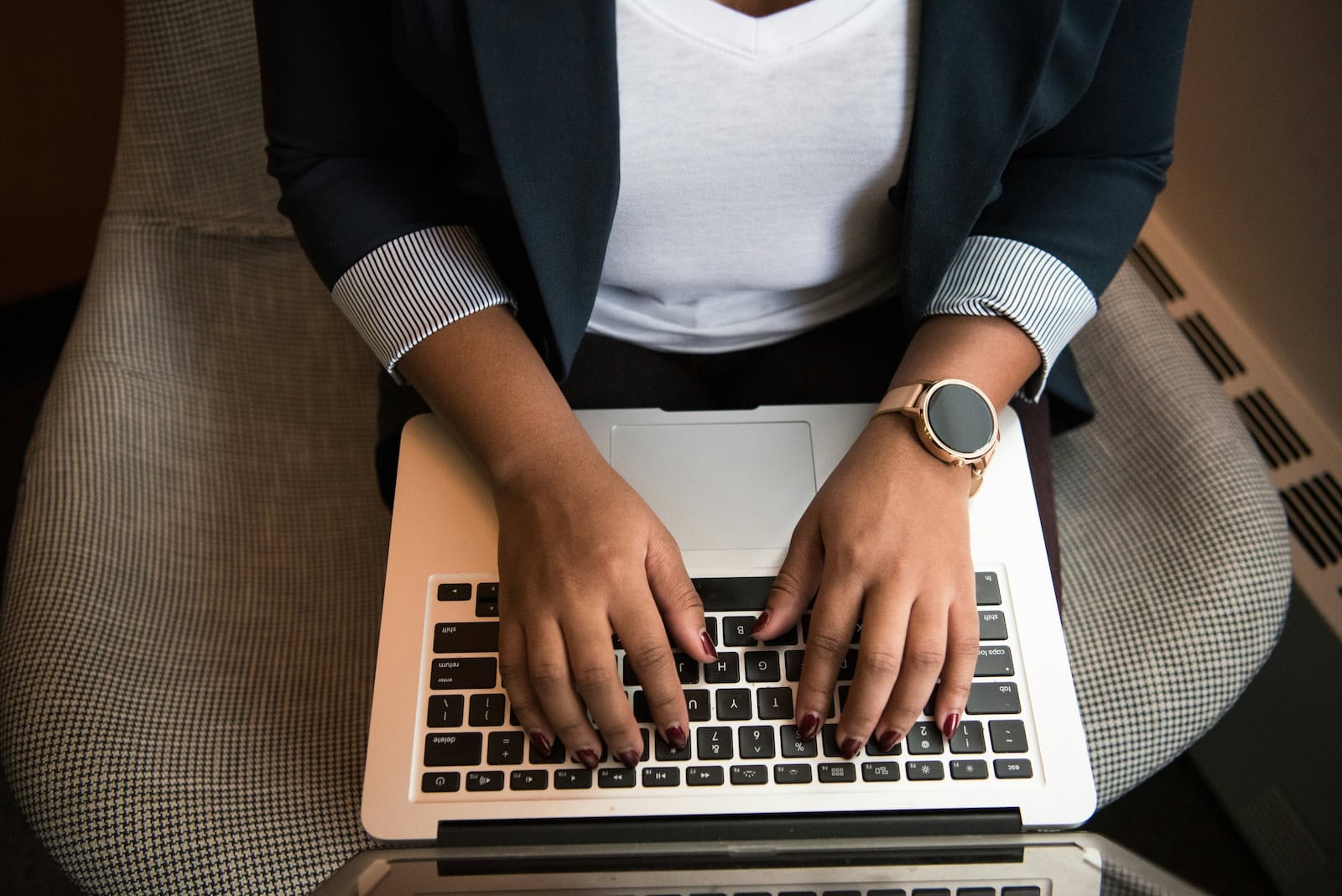 Dive Into the World of Email: Your Guide to the Best Email Marketing Platforms Person typing on a laptop keyboard